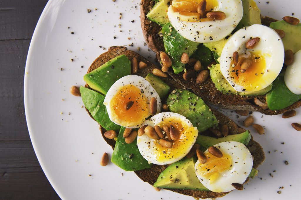 avocado toast with eggs and seeds